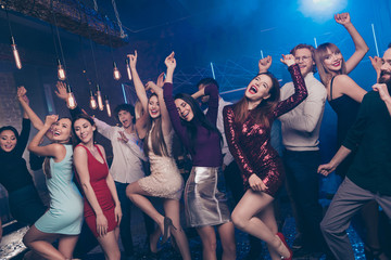 Portrait of funny funky people youth have move ecstatic thrilled evening party maker dress high-heels formalwear indoors holiday time carefree person concept