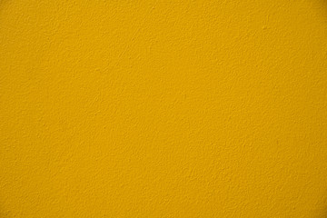 Fototapeta premium close up yellow background cement wall