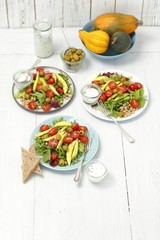 white bean, avocado and tomato salad with olives