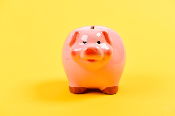 planning budget. financial problem. piggy bank on yellow background. income management. money saving. Financial education. Finances and investments bank. Financial crisis. new solutions