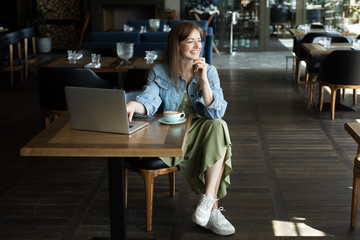 young girl drinking coffee and talking on the phone