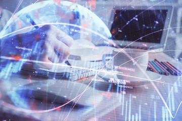 Financial chart drawn over hands taking notes background. Concept of research. Double exposure