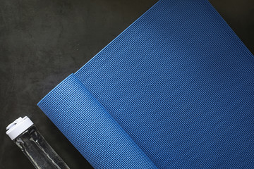 Mat for practicing yoga on the floor. Healthy lifestyle.