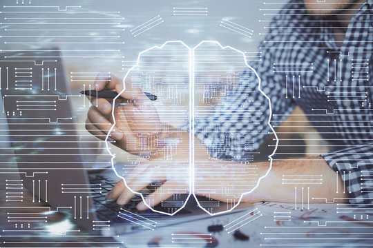 Man typing on keyboard background with brain hologram. Concept of big Data.