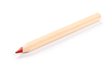Red wooden pencil isolated on white background.