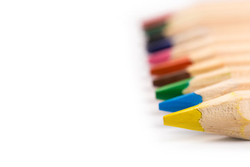 Wooden colorful ordinary pencils isolated on a white background