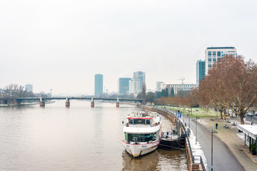 Naklejka premium Frankfurt, Germany - June 12, 2019: River view of Frankfurt am Main.Frankfurt is the largest city in the German state of Hesse and the fifth-largest city in Germany