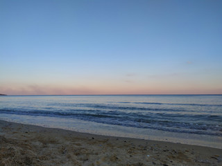 Sunset on the sea. Evening sea in summer.