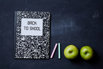 Back to school or student and education concept. Top view. Flat lay. Notebooks, apples and school accessories