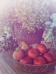 Fake fruits decorate on the table. Vintage effect image. Free space for text.