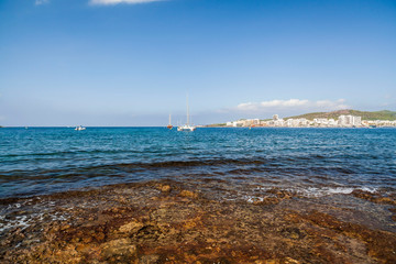 Mediterranean bayand beach in Sant Antoni de Portmany, Ibiza Island, Balearic islands.