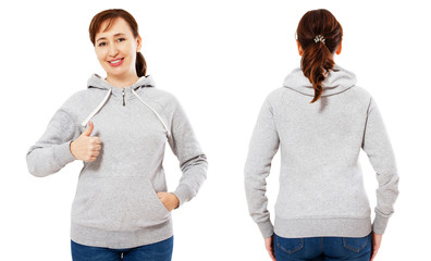 Happy beautiful middle-aged woman in a gray sweatshirt showing like sign, hoodie mock up set