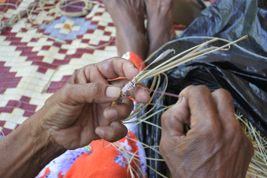 Australian Aboriginal woman basket weaving Northern Territory Australia