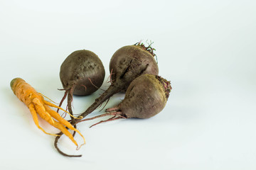 Ugly vegetables carrot and  beet isolated