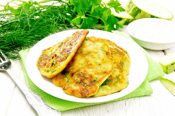 Pancakes of zucchini on napkin