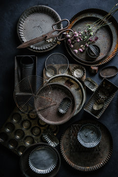 vintage bake trays and pie forms flat lay