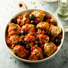 Roasted chicken with tomato and olives