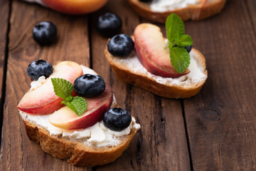 bread toast with peach and blue berry