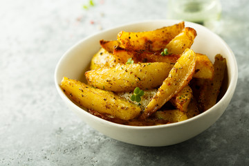 Roasted potato wedges with oregano