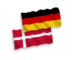 National vector fabric wave flags of Germany and Denmark isolated on white background. 1 to 2 proportion.