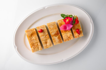 Quiche, casserole, delicious omelet from eggs, cheese, salmon, broccoli, spinach, pate. Banquet festive dishes. Gourmet restaurant menu. White background.