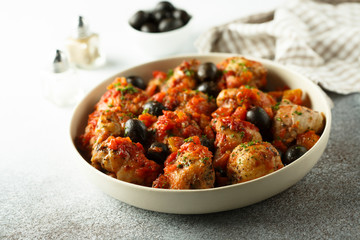 Roasted chicken with tomato and olives