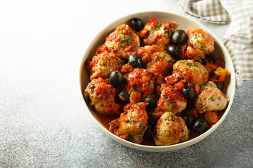 Roasted chicken with tomato and olives