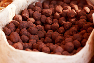 Hazelnuts covered in chocolate coating