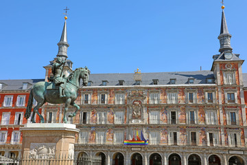 Fototapeta premium Plaza Mayor square with equestrian statue of King Philips III in Madrid, Spain