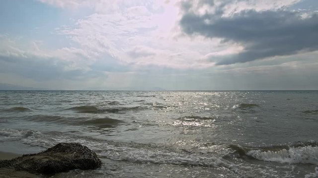 Dark Clouds Over Sea is a stock video that displays incredible footage of a seascape with dark clouds floating over the ocean.