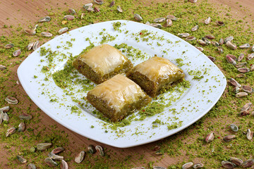 the best turkish special baklava Together with pistachios on a plate