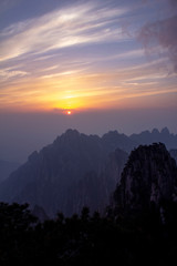 Naklejka premium Natural beautiful sunset view at Huangshan mountain scenery ( Yellow mountain ) in Anhui CHINA, It is a best of China major tourist destination. UNESCO World Heritage Site.