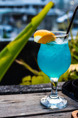 Close up of a blue cocktail drink in nice.