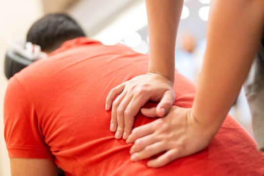 Close up of physiotherapist giving massage to a patient.