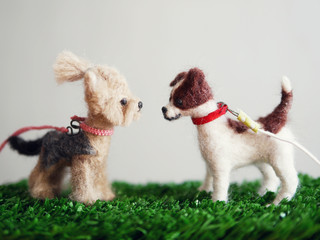 Handmade dogs. Figures of dogs made of wool.