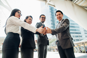 Asian business teamwork, Successful team of young perspective businesspeople.