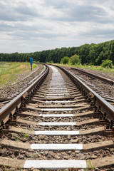 Obraz premium Railway leaving for horizon. Railway close-up.