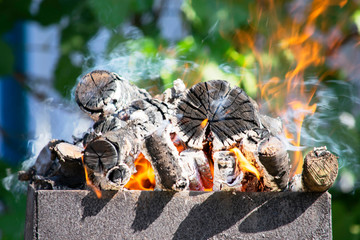 firewood burning on a brazier brazier, fire, coals, background