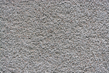 Grey stucco grungy wall surface 
