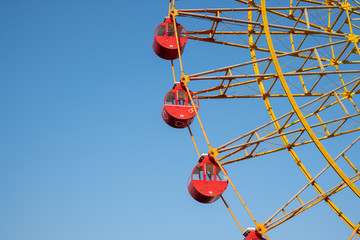 Ferris wheel with blue sky in Kobe, Japan