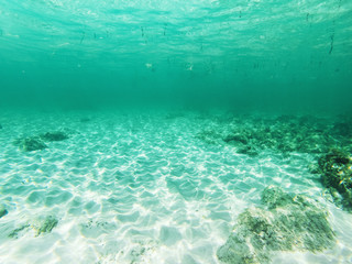 Crystal clear underwater beach view with blue water. Mallorca, Spain