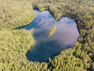 The lake Glubelka in the forest. National park Narochiansky, Belarus. Drone aerial photo