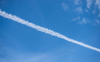 Long-distance clouds are caused by flying through the plane.