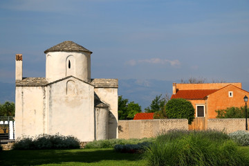 Fototapeta na wymiar Medieval church of the Holy Cross in Nin, Croatia, known as smallest cathedral in the world. 