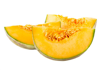heap of slices of cantaloupe isolated on white background
