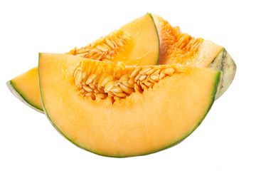heap of slices of cantaloupe isolated on white background