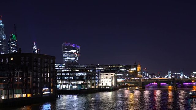 Time Lapse of London Thames River Skyline at Night With Tower Bridge and Shard in Distance