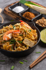 Home Made Pad thai with Shrimp and Vegetables on Marble table