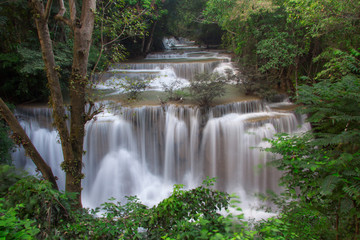 Fototapeta na wymiar Huaymaekamin Waterfall is beautiful waterfall in Kanchanaburi , Thailand