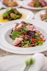 Food Table Celebration Delicious Party Meal Concept. A lot of food. Served for wedding, anniversary, other holiday. Banquet dishes in the restaurant